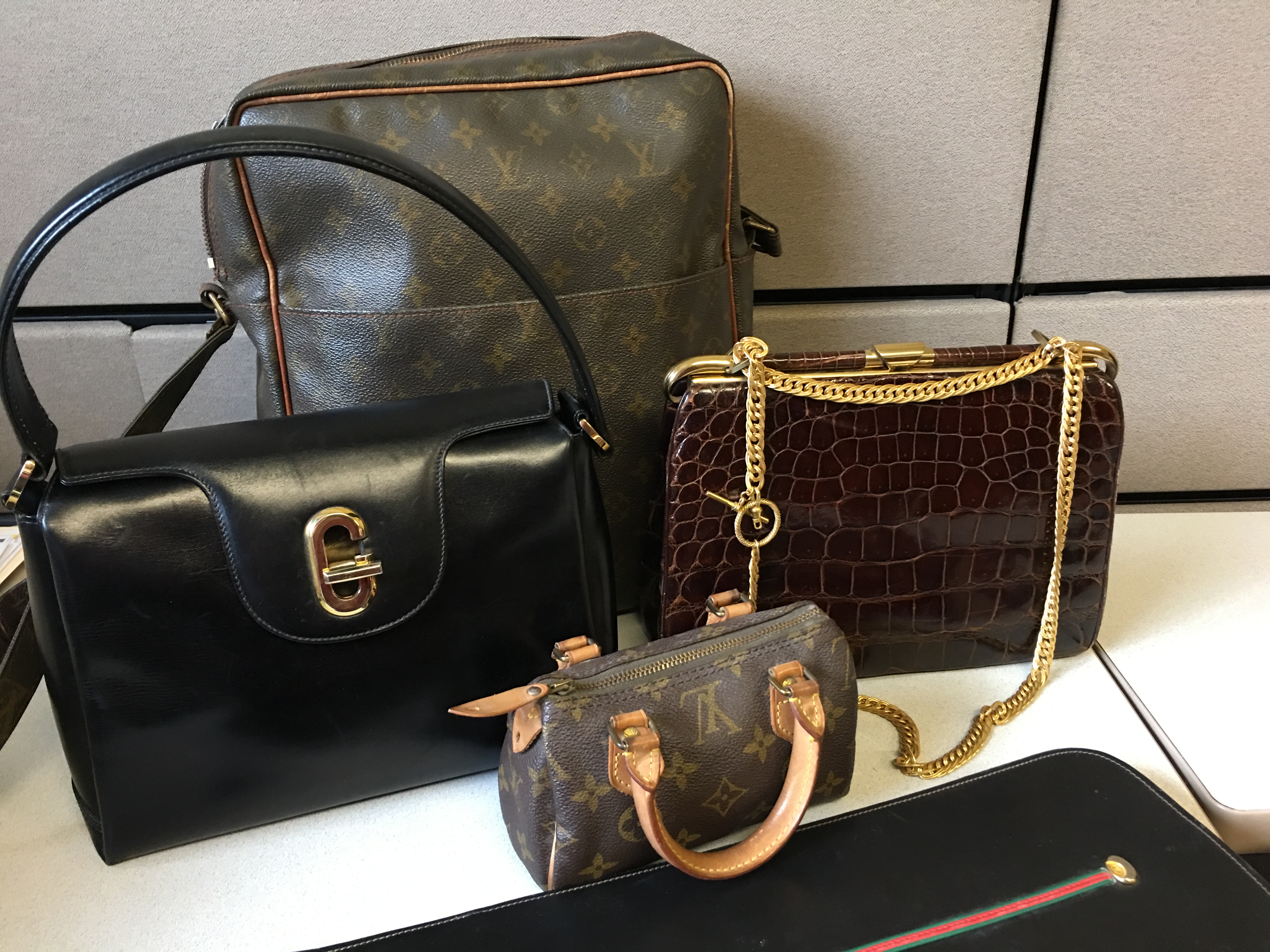 Finds” vintage purses Louis Vuitton, Cartier, Gucci, Prada